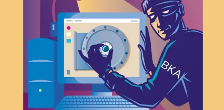 Ein Einbrecher steht vor einem Computer und öffnet einen virtuellen Safe