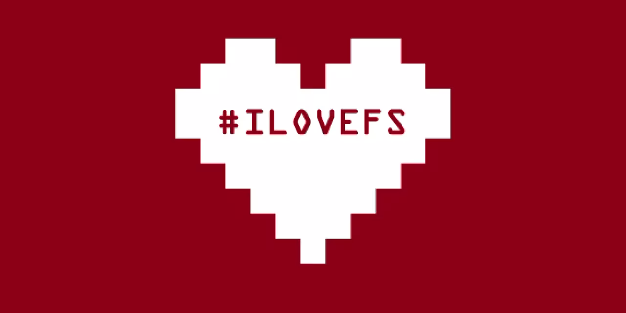 Pixelgrafik eines weißen Herzens auf rotem Grund. Darin der Text "'ILOVEFS"